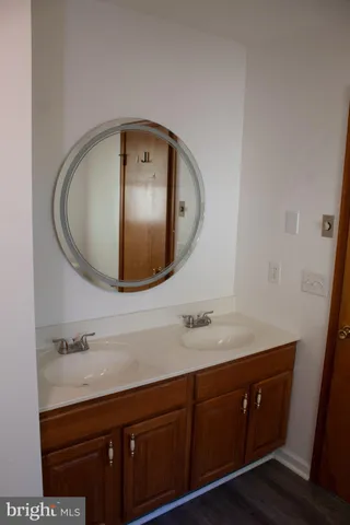 a kitchen with refrigerator and window