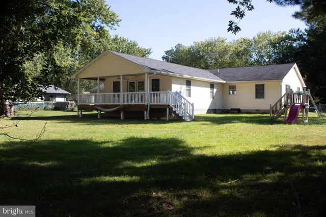 a view of a yard with an outdoor space