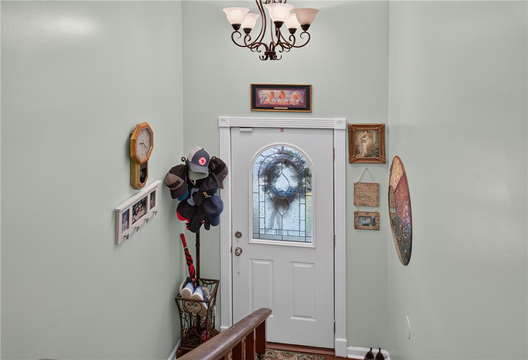 104 Laurel Lane Seneca, SC 29678 - Photo 31 of 36 A graceful entry with a detailed leaded glass door and a warm, inviting ambiance.