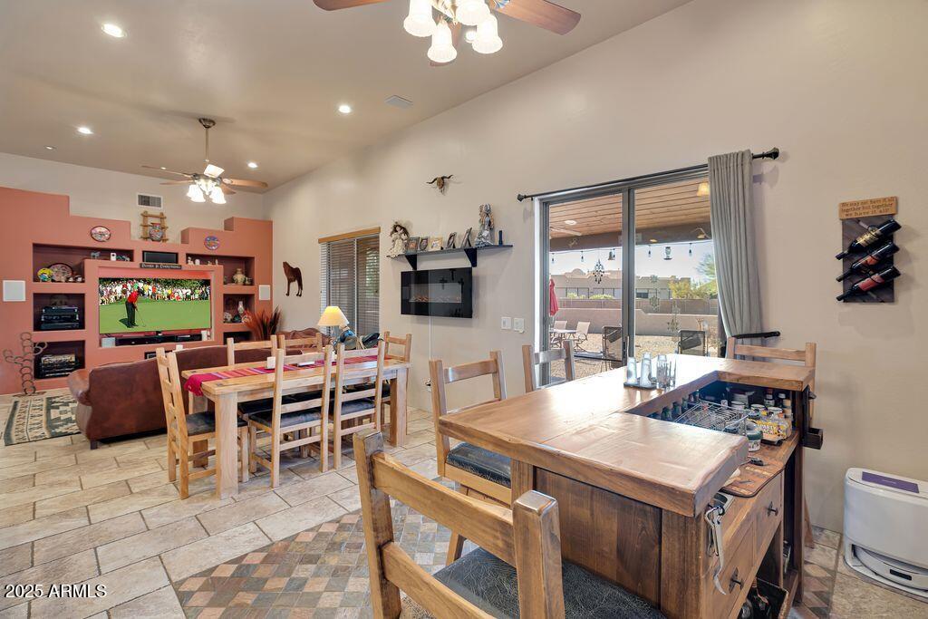 1053 East Maddock Road Phoenix, AZ 85086 - Photo 13 of 60 a view of a dining room with furniture