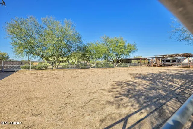 an aerial view of a house with a garden
