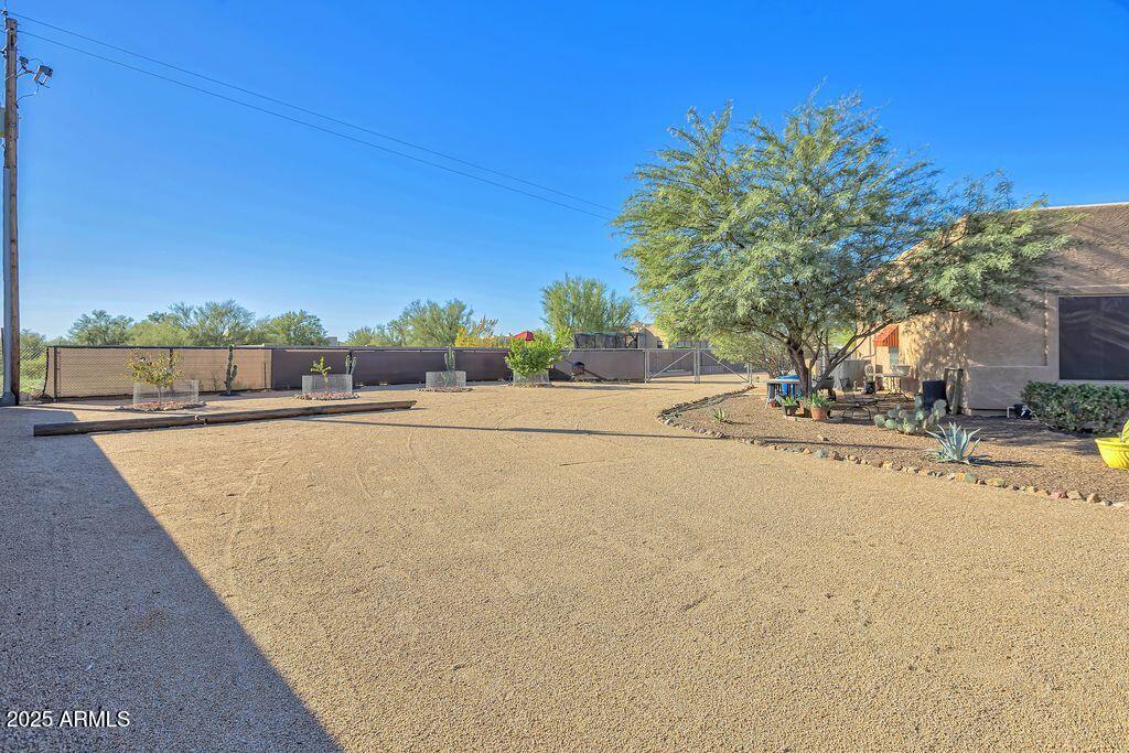 1053 East Maddock Road Phoenix, AZ 85086 - Photo 47 of 60 a view of a road with a building in the background