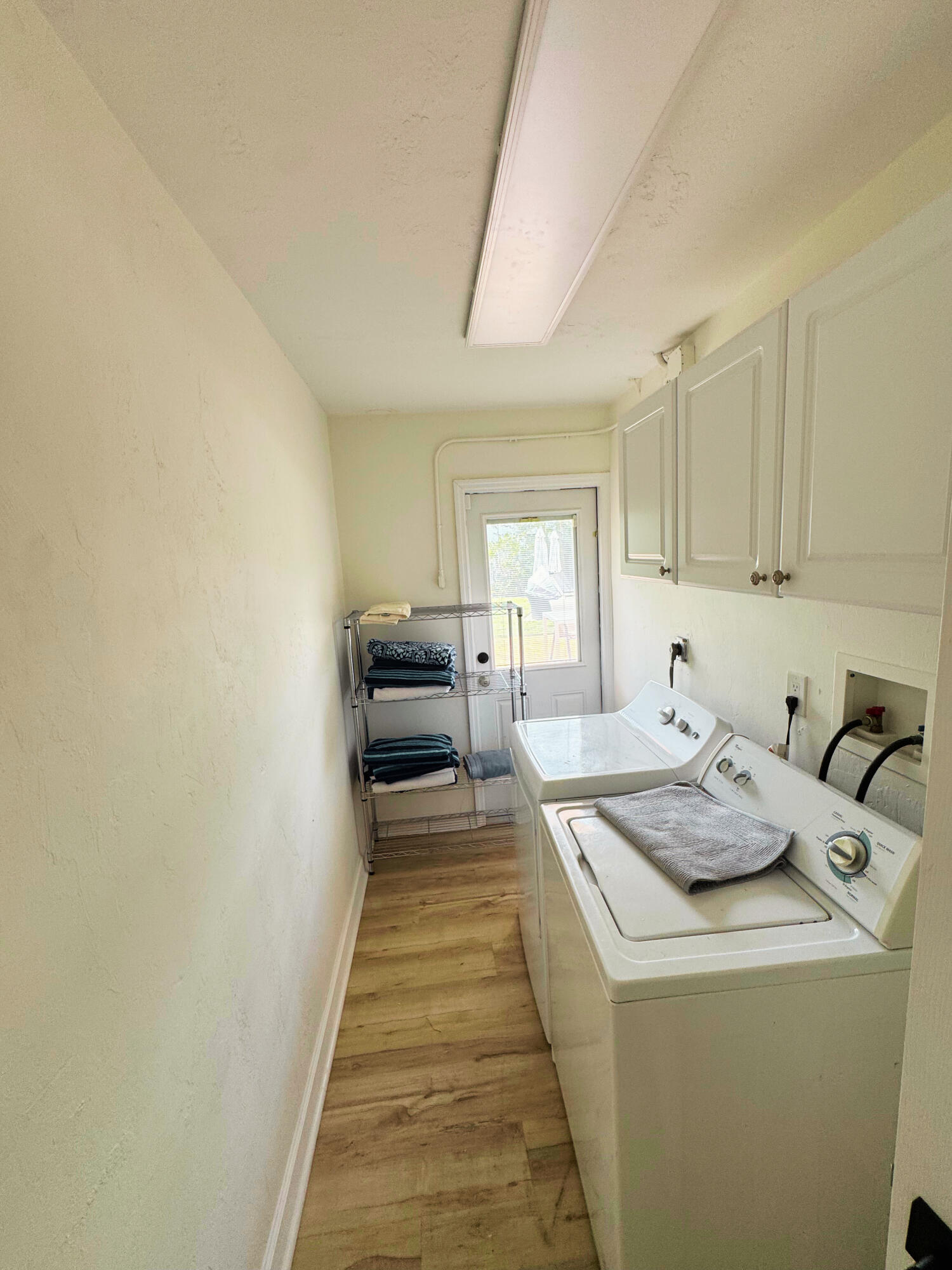 300 Northeast 7th Street Boca Raton, FL 33432 - Photo 12 of 16 a kitchen that has a sink and a stove in it