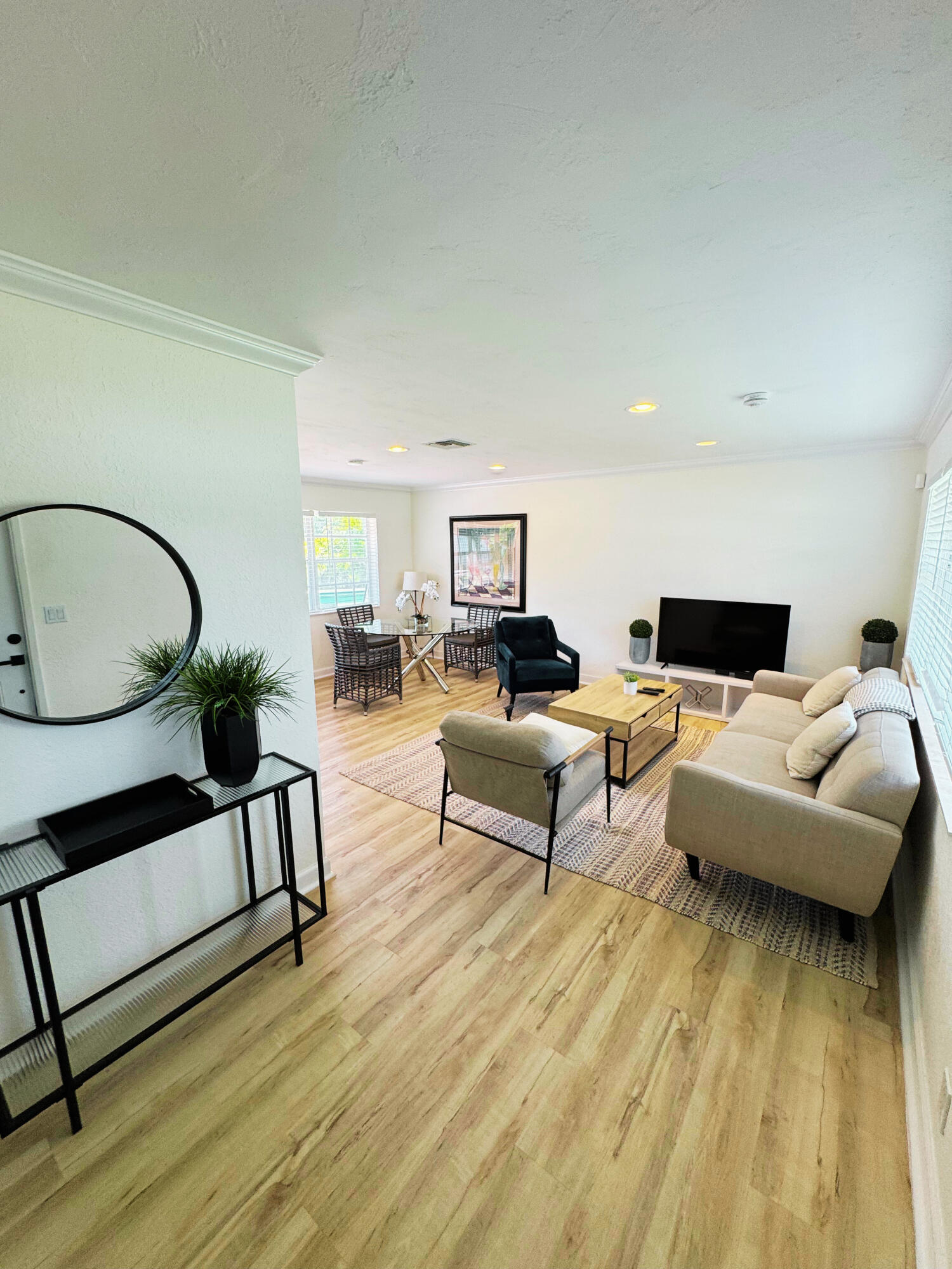 300 Northeast 7th Street Boca Raton, FL 33432 - Photo 2 of 16 a living room with furniture and a wooden floor
