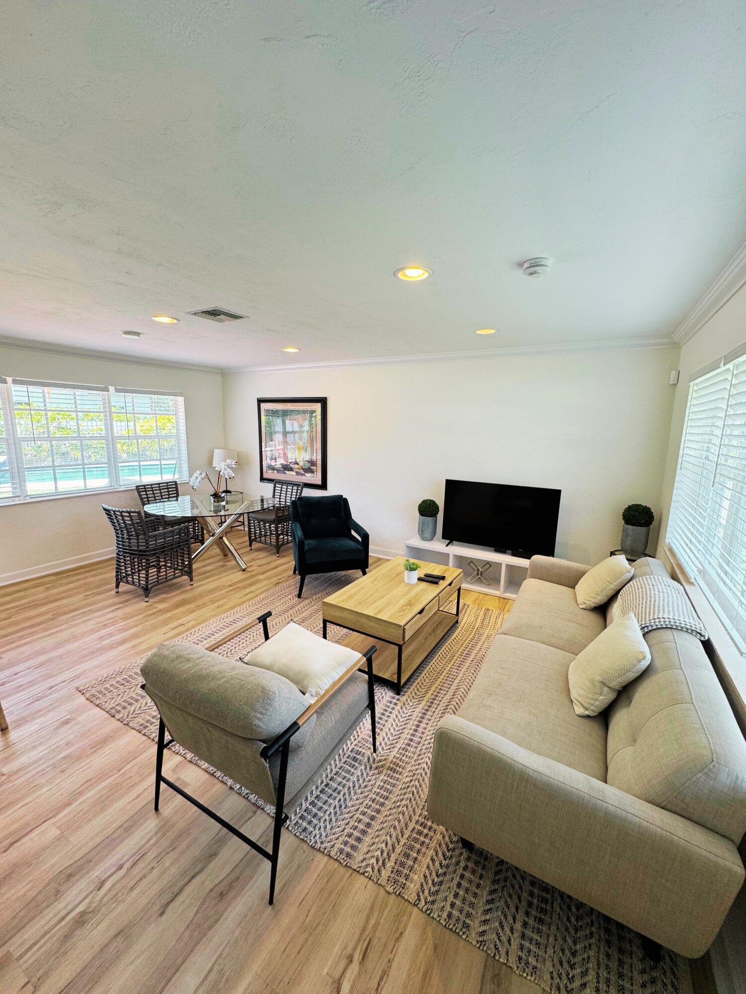 300 Northeast 7th Street Boca Raton, FL 33432 - Photo 3 of 16 a living room with furniture and wooden floor