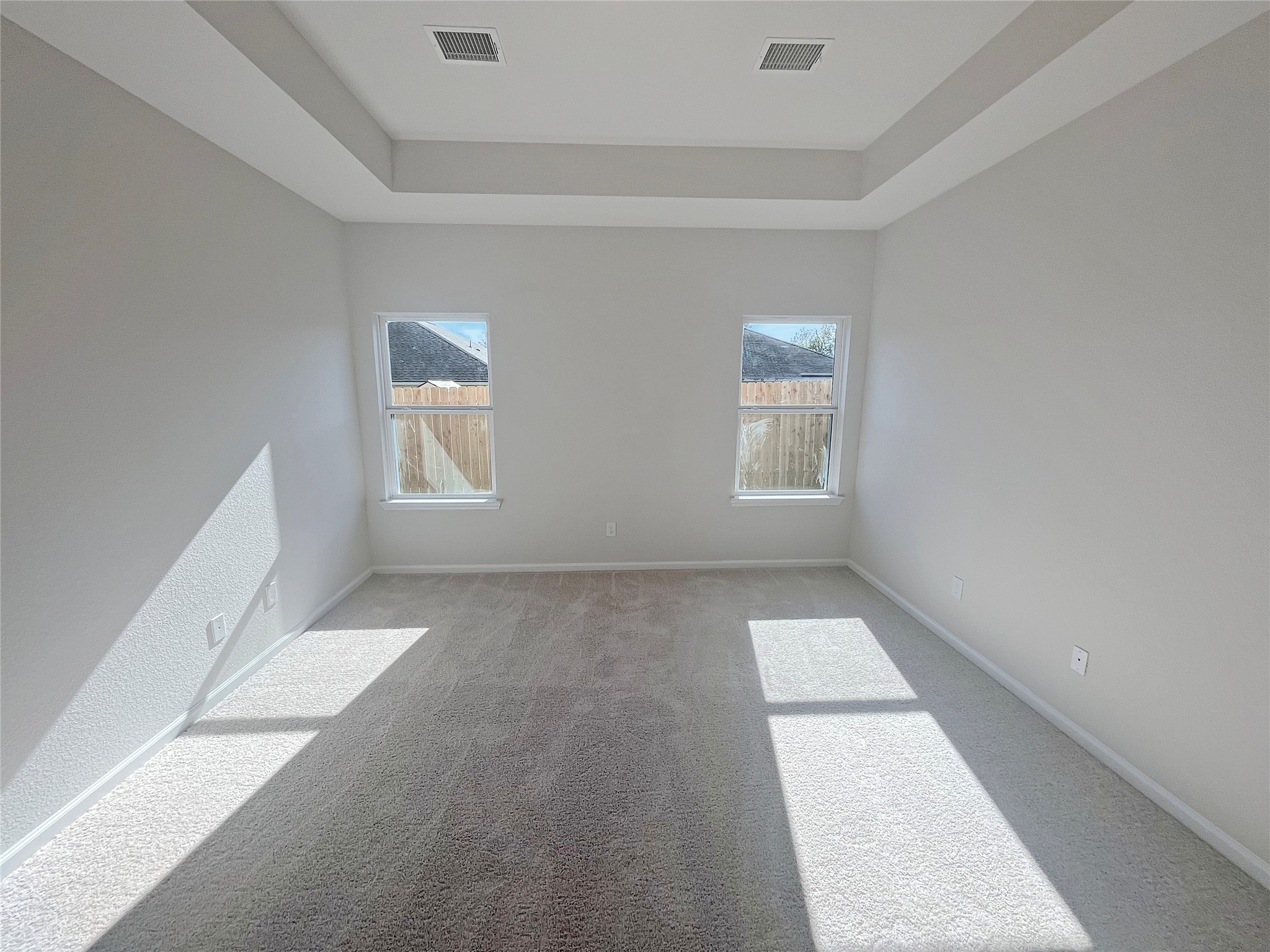 9781 Enclave Ridge Road Willis, TX 77318 - Photo 10 of 24 The Robin II- Primary Suite with Tray Ceiling. Sample image to be used for example only, colors, options and upgrades vary.