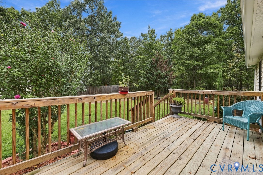 133 Ford Road Bumpass, VA 23024 - Photo 54 of 55 Wood deck with a natural finish, wood railing, and