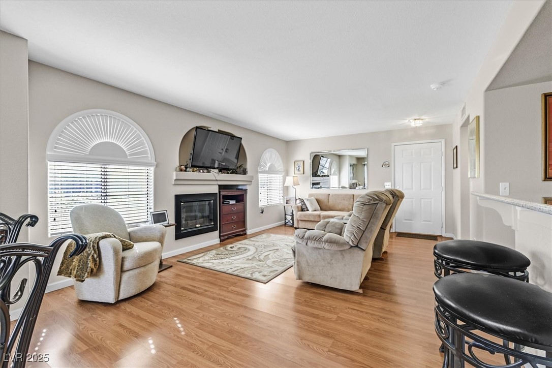 7950 West Flamingo Road, Unit 1054 Las Vegas, NV 89147 - Photo 3 of 24 Large Great Room w/Fireplace for those Cozy Evenings