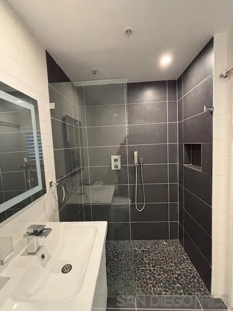 3919 Normal Street San Diego, CA 92103 - Photo 12 of 14 a bathroom with a shower