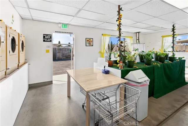 a view of a dining room with furniture window and entryway