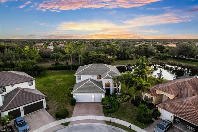 an aerial view of a house with a garden