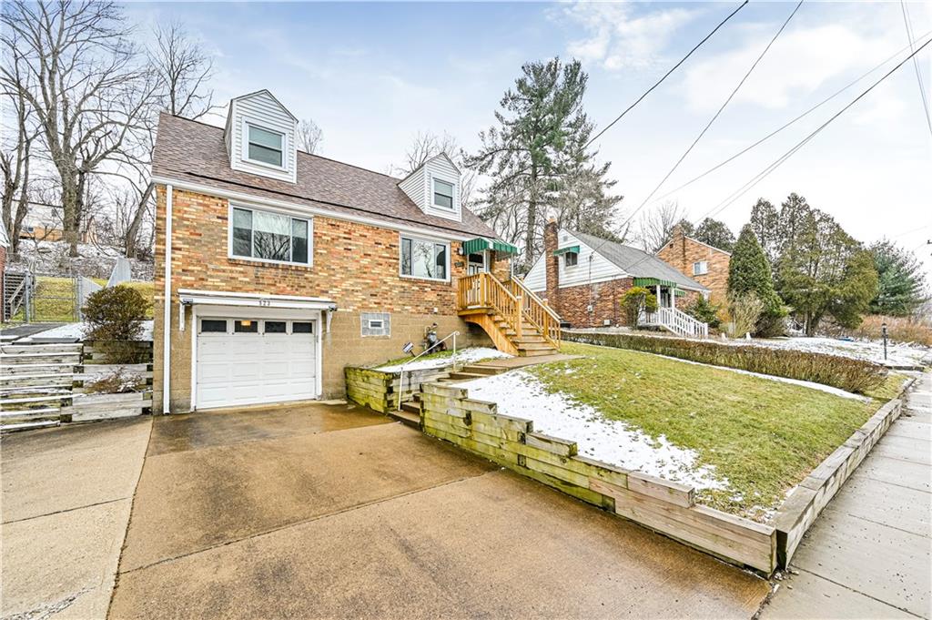 523 Beulah Road Pittsburgh, PA 15235 - Photo 2 of 36 a view of a swimming pool with a patio