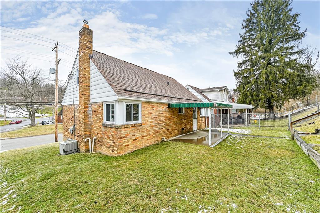 523 Beulah Road Pittsburgh, PA 15235 - Photo 35 of 36 a view of a house with a yard patio and sitting area
