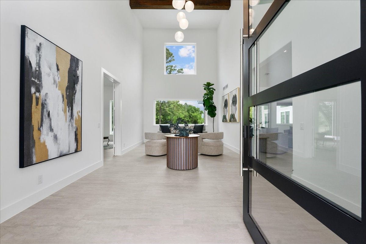 7627 Scott Avenue Manvel, TX 77578 - Photo 7 of 50 Make a statement from the moment you walk in with this grand foyer with 25ft vaulted ceilings.