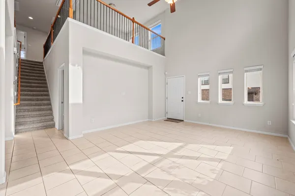 a kitchen with stainless steel appliances granite countertop a sink a stove a microwave and cabinets