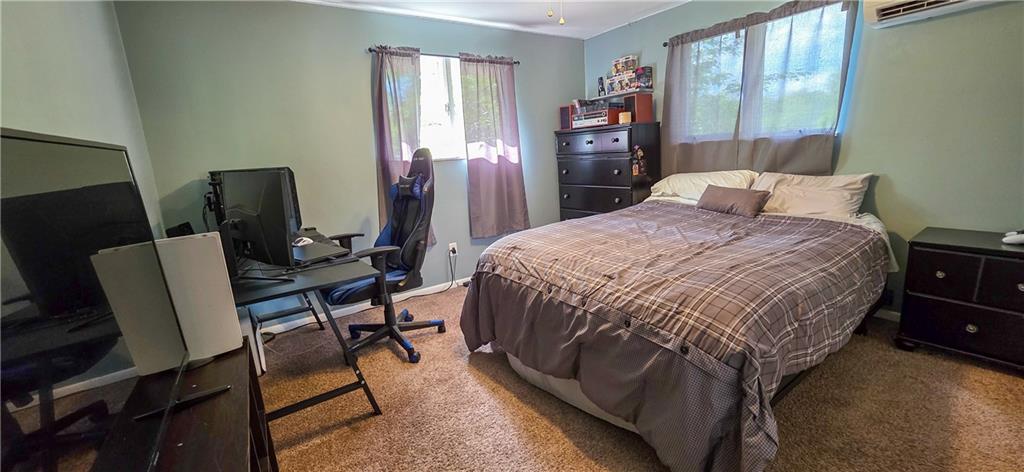 532 Strope Road Burgettstown, PA 15021 - Photo 12 of 20 a bedroom with a bed a desk and chair