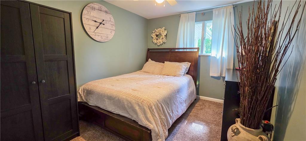 532 Strope Road Burgettstown, PA 15021 - Photo 13 of 20 a bed sitting in a bedroom next to a window