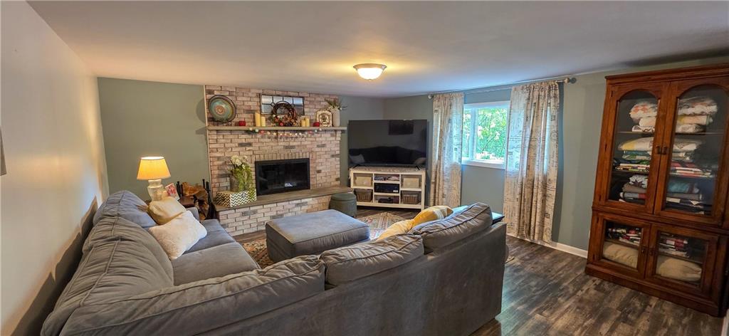 532 Strope Road Burgettstown, PA 15021 - Photo 15 of 20 a living room with furniture fireplace and flat screen tv