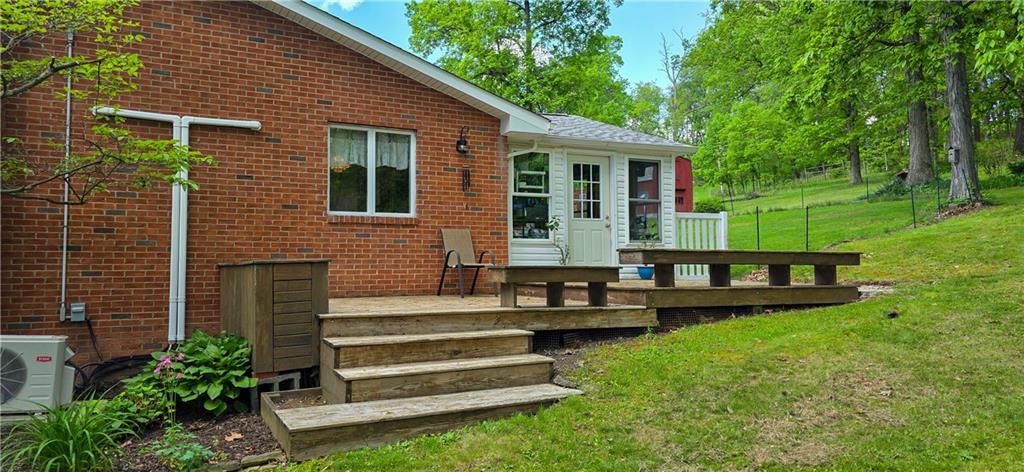 532 Strope Road Burgettstown, PA 15021 - Photo 19 of 20 a view of a house with a backyard and sitting area