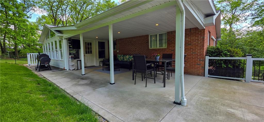 532 Strope Road Burgettstown, PA 15021 - Photo 20 of 20 a view of a house with a chairs and table in a patio