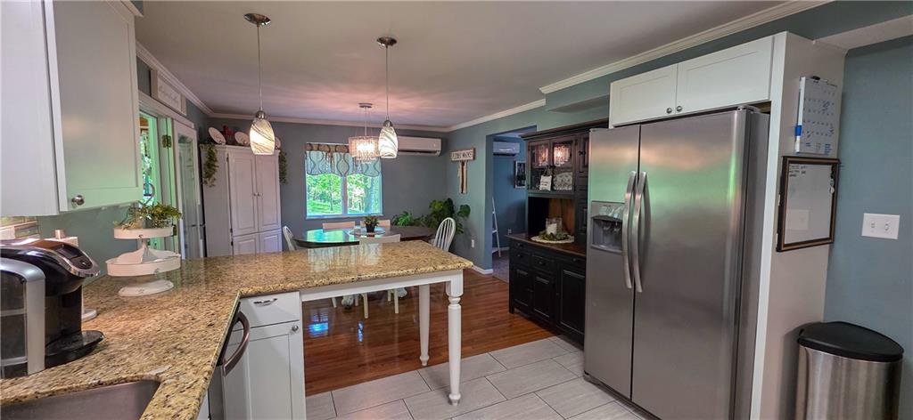 532 Strope Road Burgettstown, PA 15021 - Photo 3 of 20 a kitchen with stainless steel appliances granite countertop a refrigerator and a sink