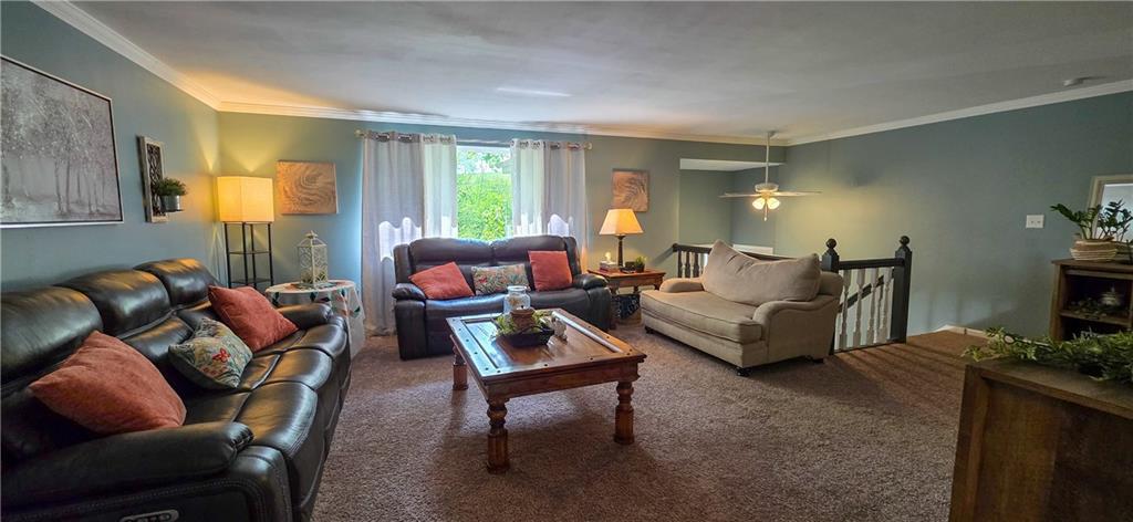 532 Strope Road Burgettstown, PA 15021 - Photo 6 of 20 a living room with furniture and a flat screen tv