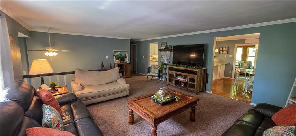 532 Strope Road Burgettstown, PA 15021 - Photo 7 of 20 a living room with furniture and a flat screen tv