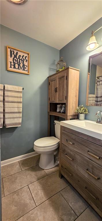 532 Strope Road Burgettstown, PA 15021 - Photo 9 of 20 a bathroom with a toilet sink and mirror