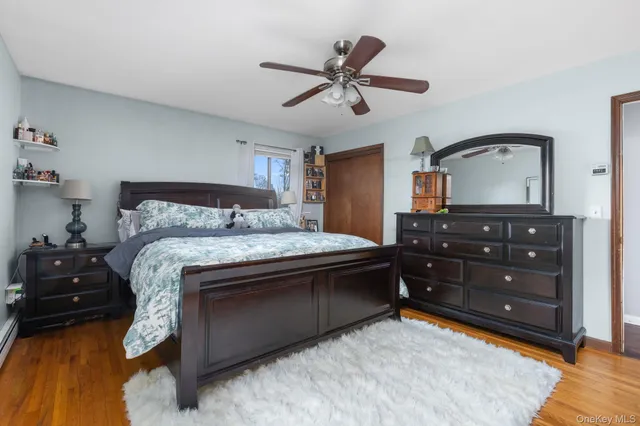 a bed room with a bed and a dresser
