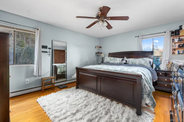 a bed room with a bed and a window