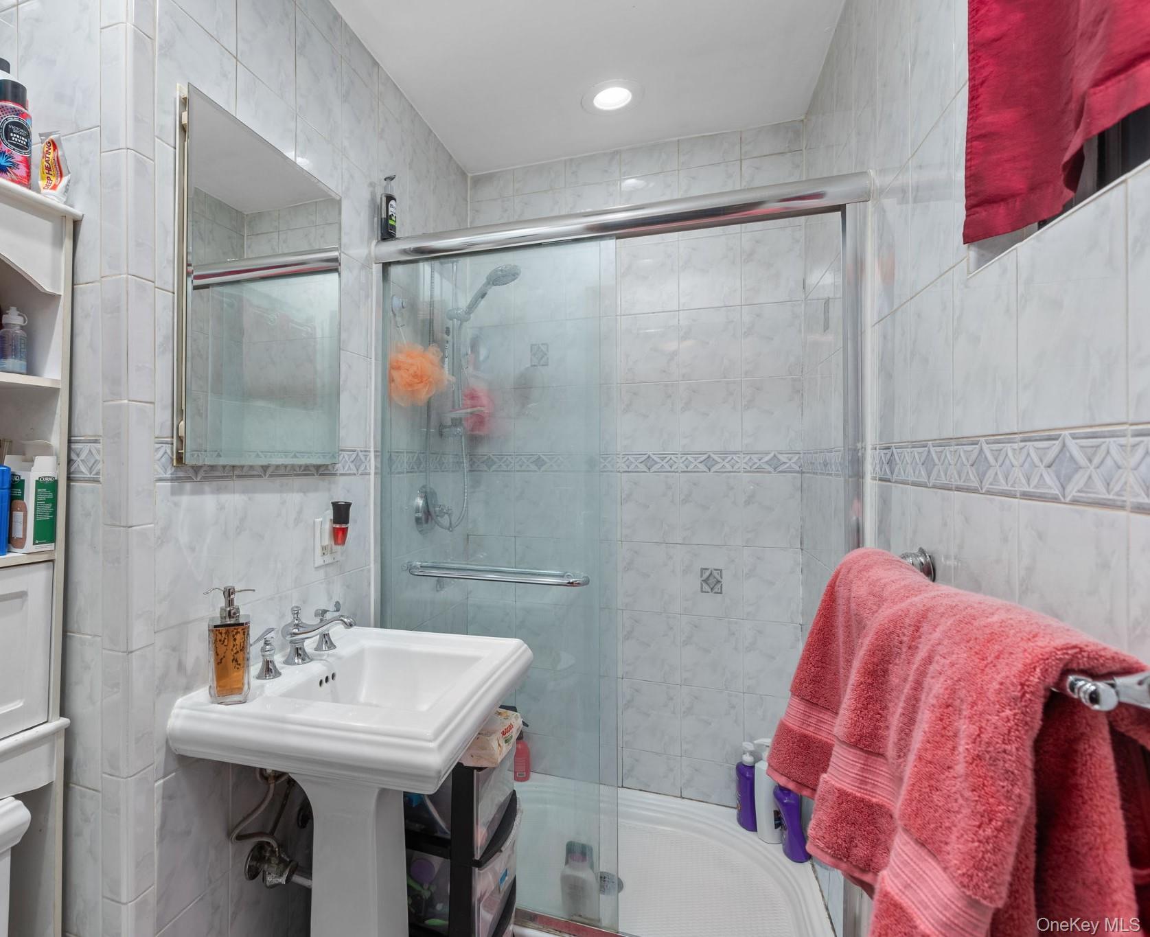 97 Old Road Brewster, NY 10509 - Photo 19 of 23 Full bathroom featuring tile walls and a shower stall
