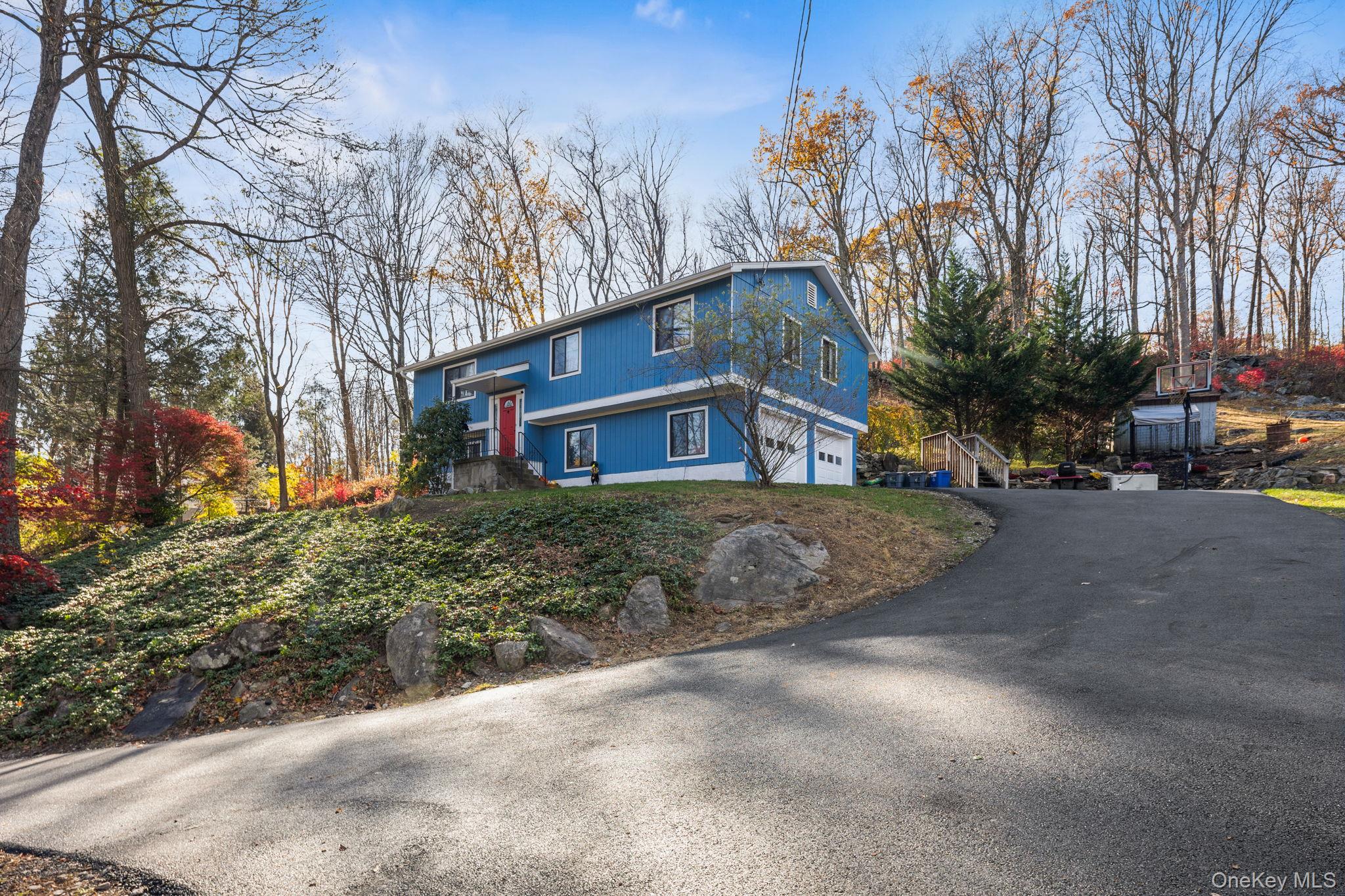 97 Old Road Brewster, NY 10509 - Photo 2 of 23 View of front of property featuring driveway and an attached garage