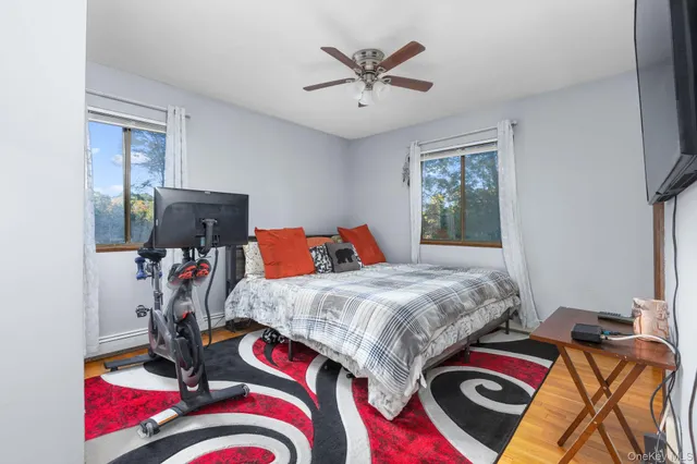 a bed room with a bed and a chandelier