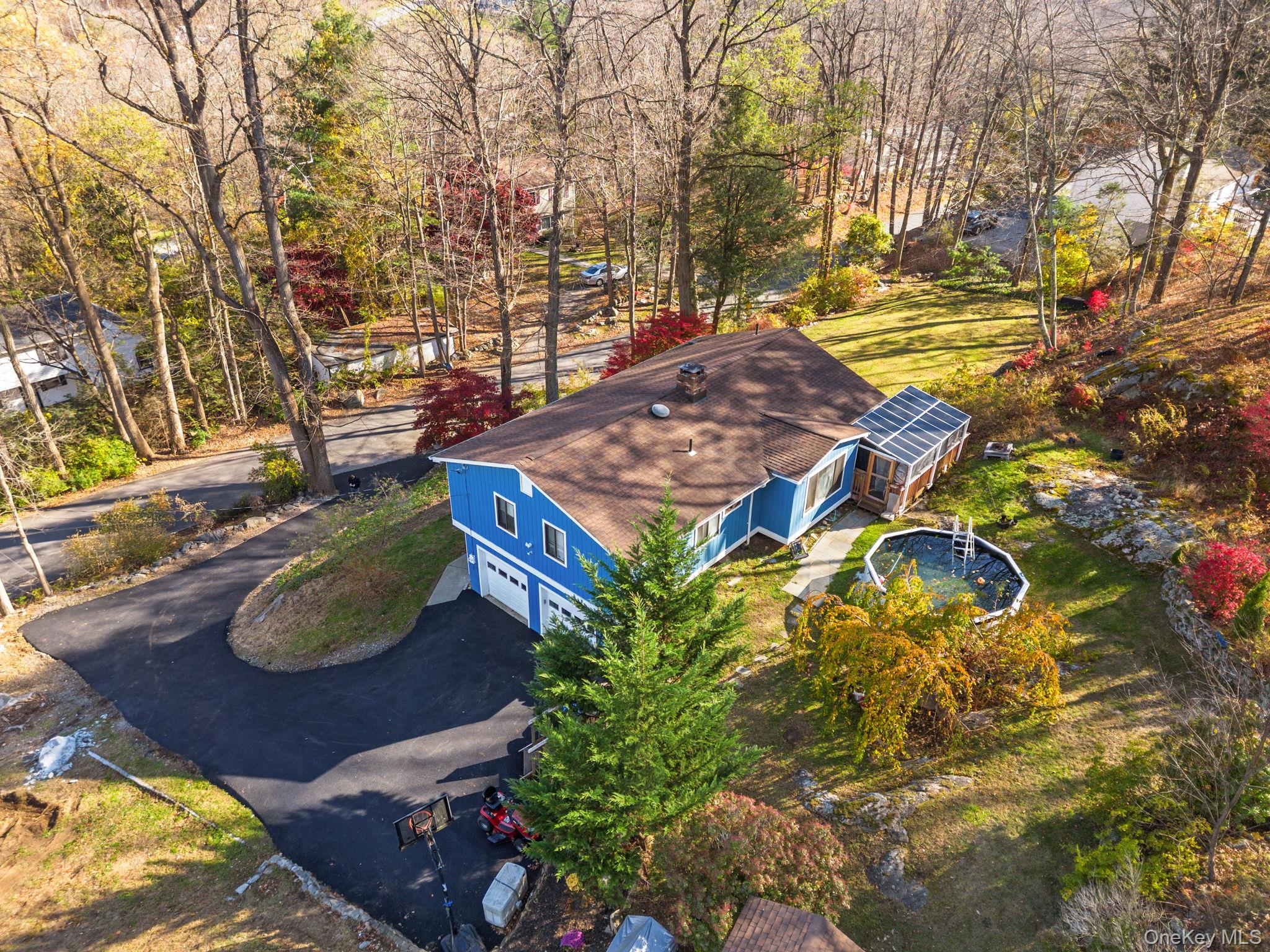 97 Old Road Brewster, NY 10509 - Photo 4 of 23 Aerial view of a tree filled landscape