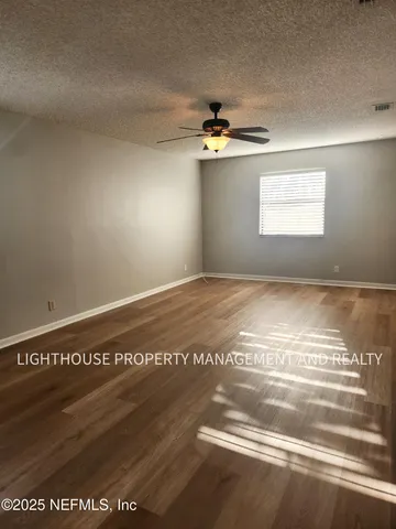 a view of a room with an empty space