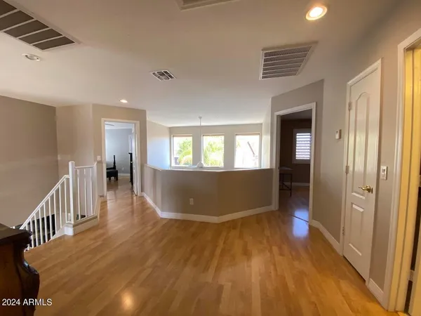 a view of livingroom and hardwood floor