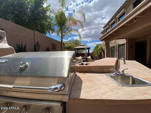 a view of a kitchen with a sink and dishwasher