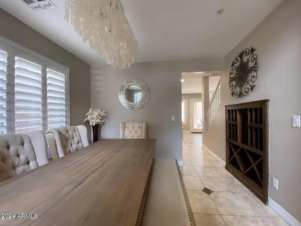 a view of a bedroom with furniture and staircase