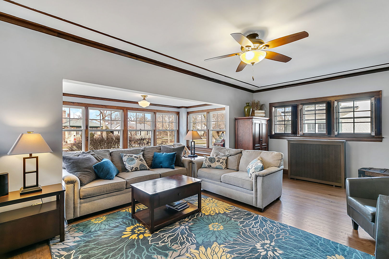 257 Herrick Road Riverside, IL 60546 - Photo 2 of 34 a living room with furniture ceiling fan and a window