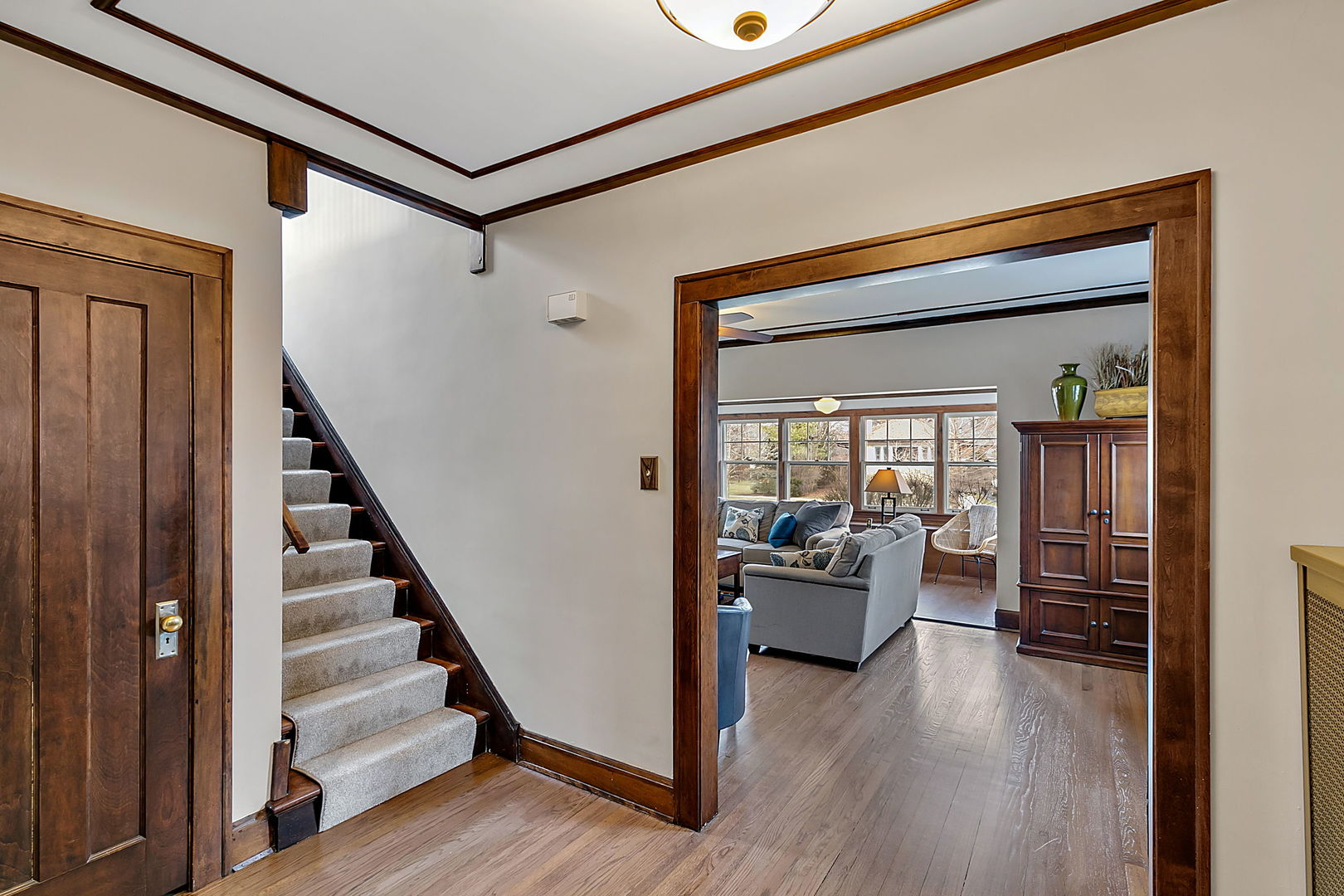 257 Herrick Road Riverside, IL 60546 - Photo 7 of 34 a view of a livingroom with furniture and hardwood floor