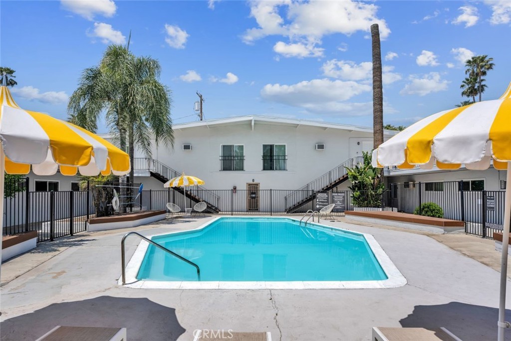 3581 Chicago Avenue Riverside, CA 92507 - Photo 1 of 5 a swimming pool with outdoor seating and yard