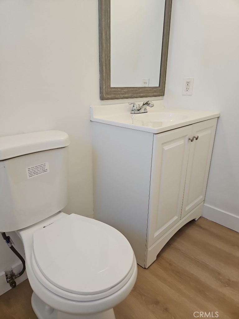 3581 Chicago Avenue Riverside, CA 92507 - Photo 5 of 5 a bathroom with a sink and a mirror