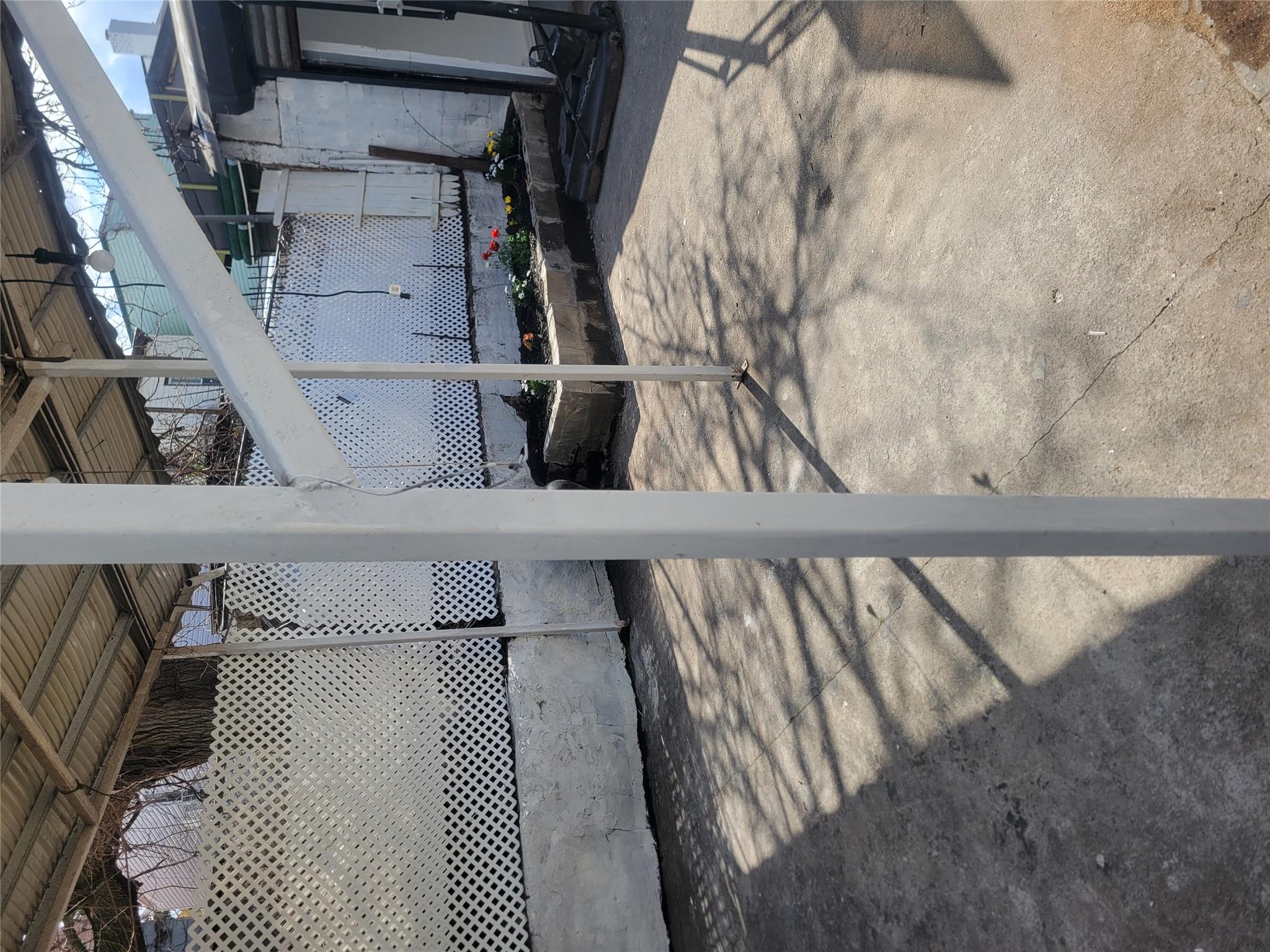 35-14 109th Street Queens, NY 11368 - Photo 37 of 38 View of patio featuring fence