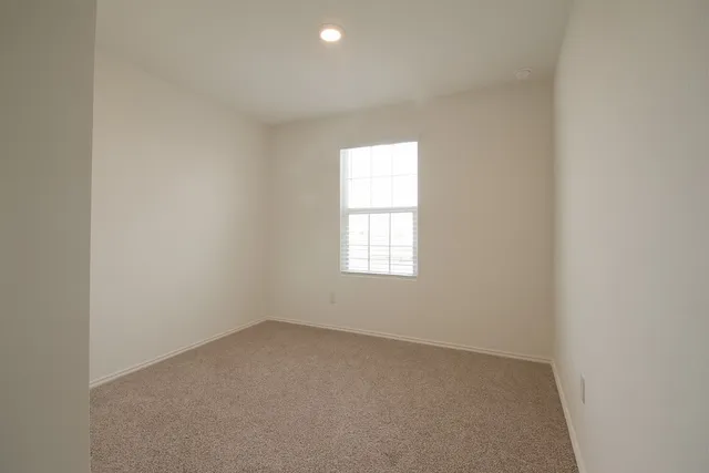 an empty room with a window