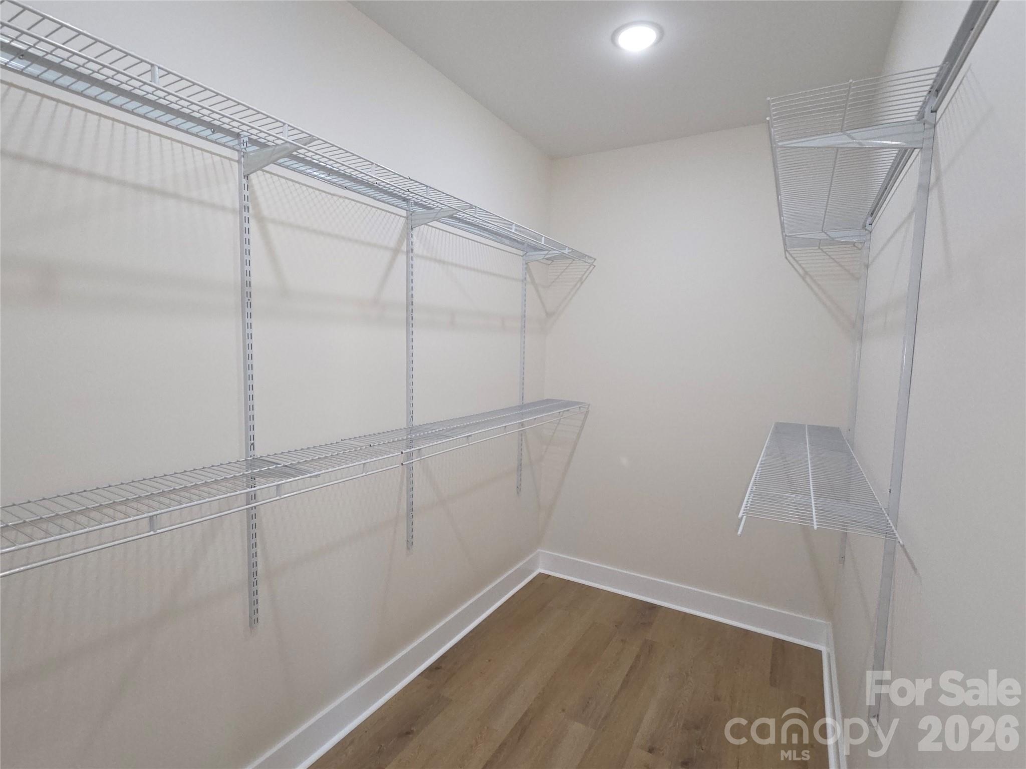 613 Bethany Road Albemarle, NC 28001 - Photo 14 of 26 a view of a room with racks on the wall