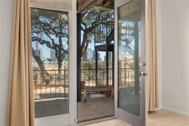 a view of a glass door and a glass door
