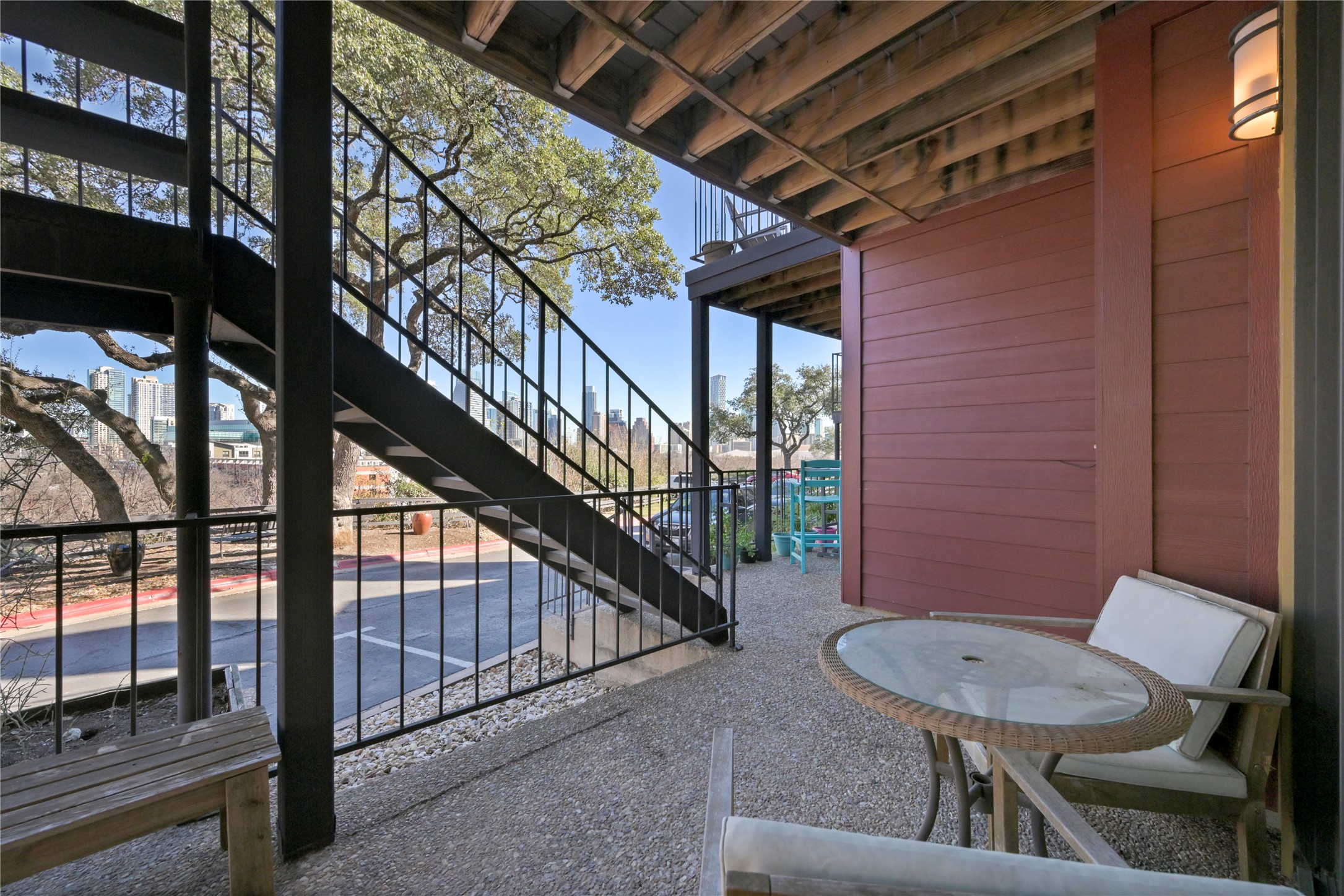 1501 Barton Springs Road, Unit 118 Austin, TX 78704 - Photo 8 of 23 Front patio offering views of the city skyline in the distance.