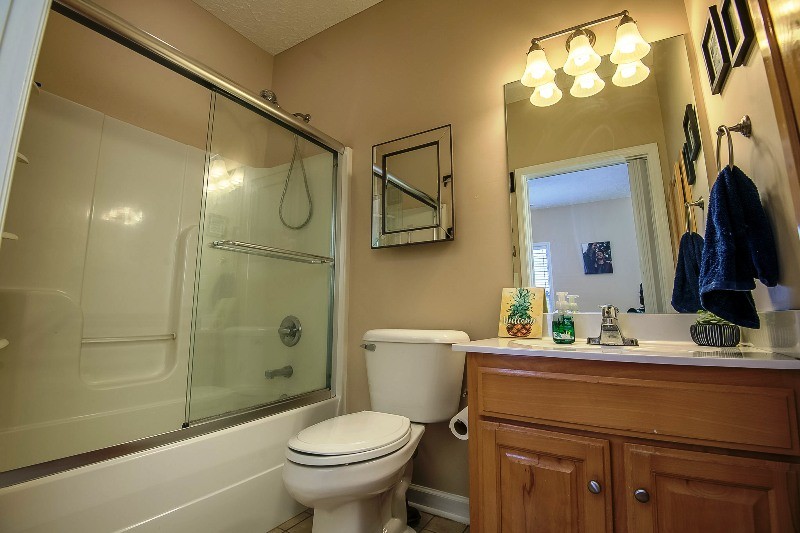987 Boynton Valley Road Manchester, TN 37355 - Photo 16 of 38 a bathroom with a sink a toilet and shower