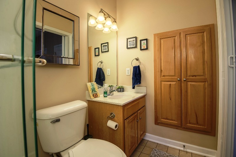 987 Boynton Valley Road Manchester, TN 37355 - Photo 17 of 38 a bathroom with a toilet sink and mirror