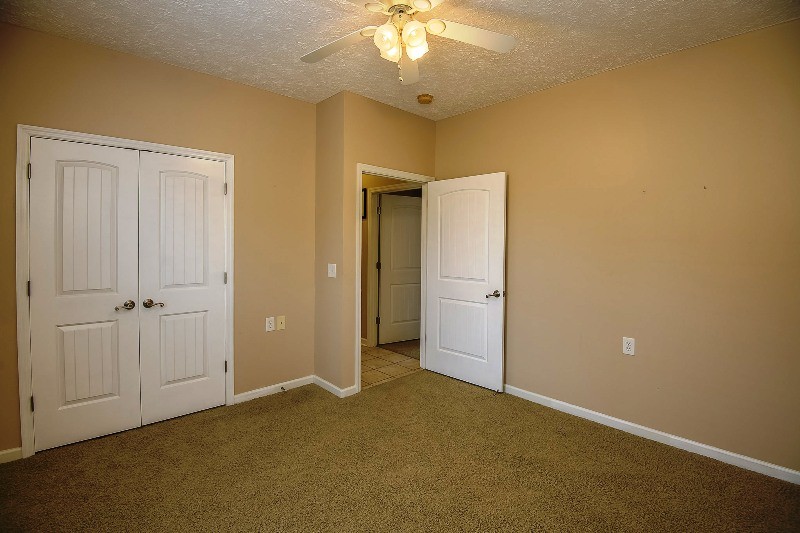 987 Boynton Valley Road Manchester, TN 37355 - Photo 19 of 38 a view of empty room with a ceiling fan